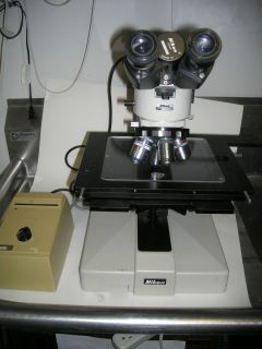 Nikon Microscope with 4 Objective Lenses L56