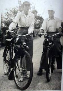 Photo Couple on Gas Powered Bicycle Motorcycle