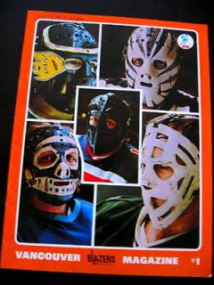 Vintage 1970s hockey program colorful WHA goalie masks cover Blazers