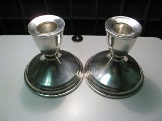 Vintage Sterling Silver candlesticks (2). Dutchin weighted. 3 1/4H x 3