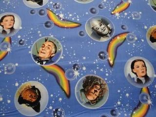 OF OZ CHARACTER FACES IN BUBBLES TOSSED ON BLUE B/G F/Q QUILTING