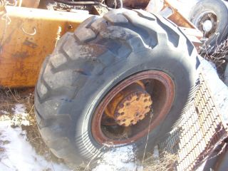 Used Wheel Loader Tire on Case Rim Firestone 12 Bolt Rim Wheel