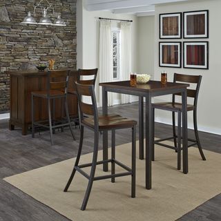 Cabin Creek 3 piece Bistro Set (Chestnut Materials mahogany veneers with engineered wood and metalFinish Heavily distressed multi step chestnut finish Table Dimensions 42 inches high x 30 inches wide x 30 inches deepStool dimensions 45.5 inches high x