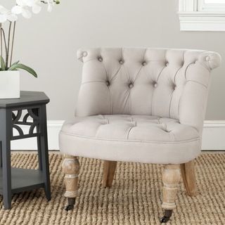 Safavieh Carlin Taupe Tufted Chair (TaupeMaterials: Birch wood/ linen fabricFinish: White washedSeat dimensions: 22.8 inches wide x 19 inches deepSeat height: 15.4 inchesDimensions: 28 inches high x 26.4 inches wide x 24.8 inches deepThis product will shi
