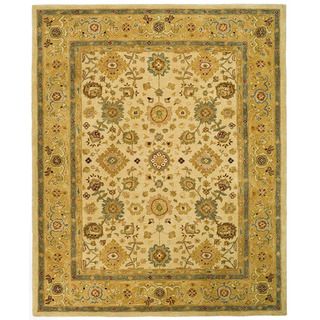 Handmade Heirloom Ivory/ Gold Wool Rug (96 X 136) (IvoryPattern: OrientalMeasures 0.625 inch thickTip: We recommend the use of a non skid pad to keep the rug in place on smooth surfaces.All rug sizes are approximate. Due to the difference of monitor color