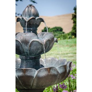 Isabelle Aged Green Bronze Outdoor Fountain (Tan, greyWeatherproof YesCapacity 1.58 gallonsMounting NoneLighting No lightsWater pump UL tested submersibleVoltage 12 voltsDimensions 32.7 inches high x 17.5 inches wide x 17.5 inches longWeight 16.5 